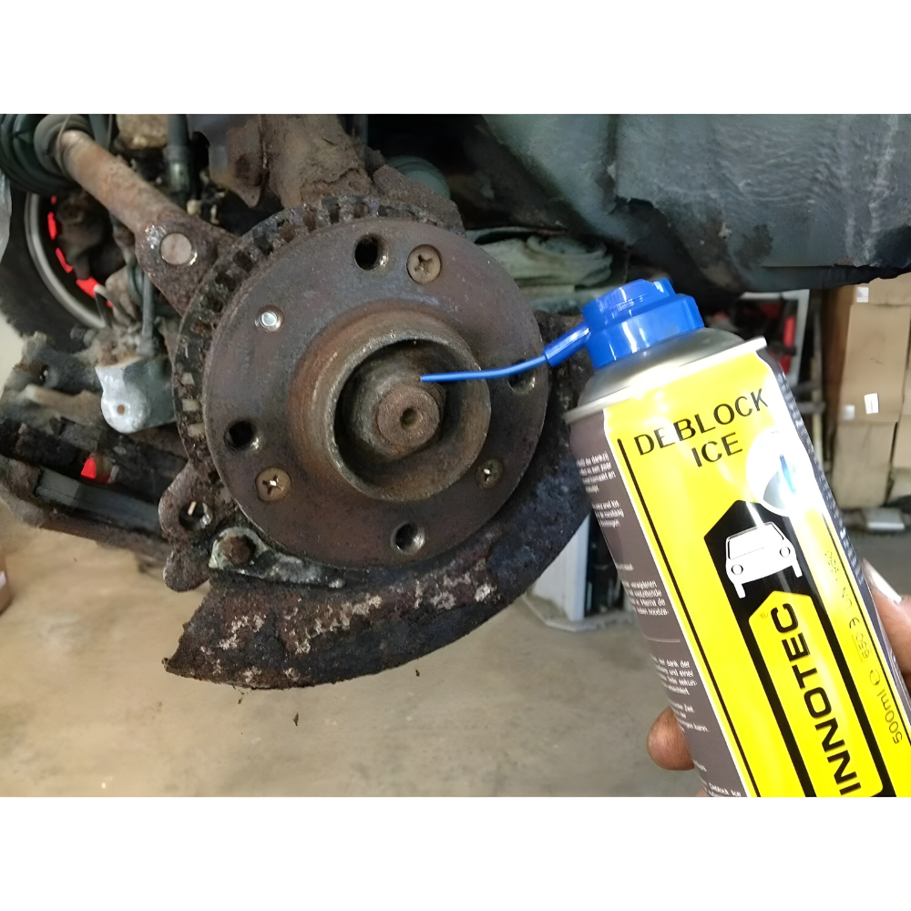 innotec-deblock-ice-200ml-rust-remover Innotec Deblock Ice 200ml – Powerful rust remover being sprayed onto brake caliper for easy disassembly