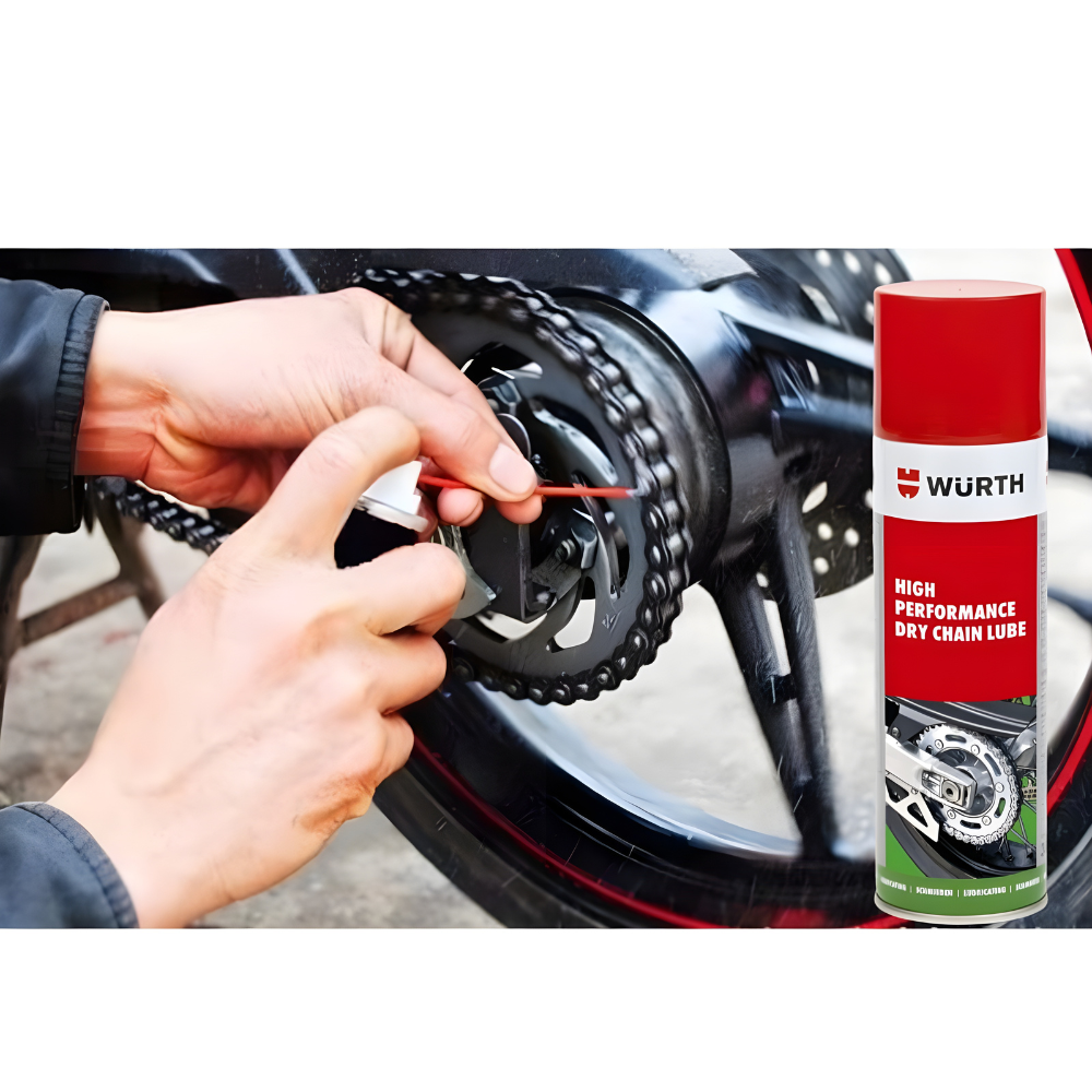 wurth-high-performance-dry-motorcycle-chain-lube-150ml-spray-motorcycle-chain wurth high performance dry motorcycle chain lube 150ml being sprayed on motorcycle chain for smooth operation, corrosion protection, and o-ring safe lubrication