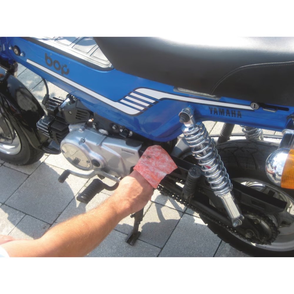 Würth Industrial Cleaning Wipes cleaning grease from a motorcycle engine and frame