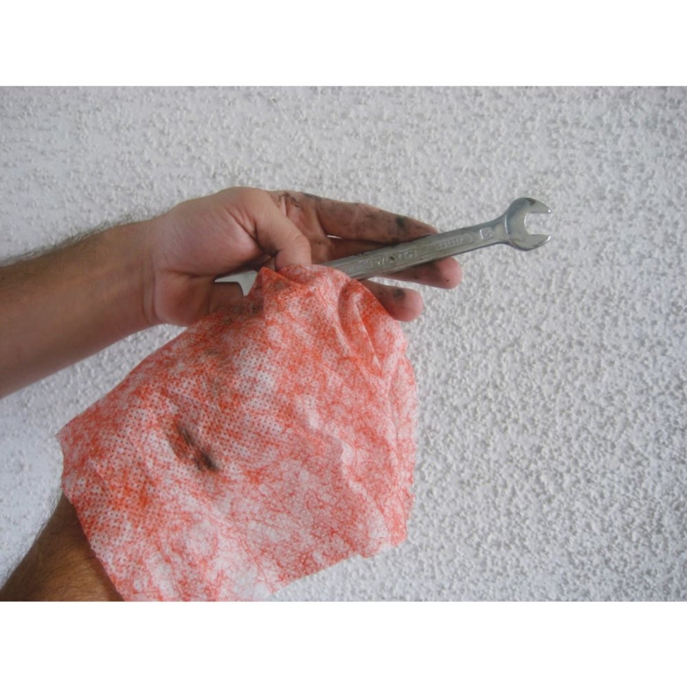 Würth Industrial Cleaning Wipes removing grease from a workshop spanner